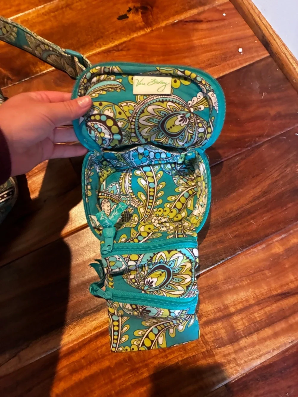 Peacock green Vera Bradley backpack with little necessity pouch